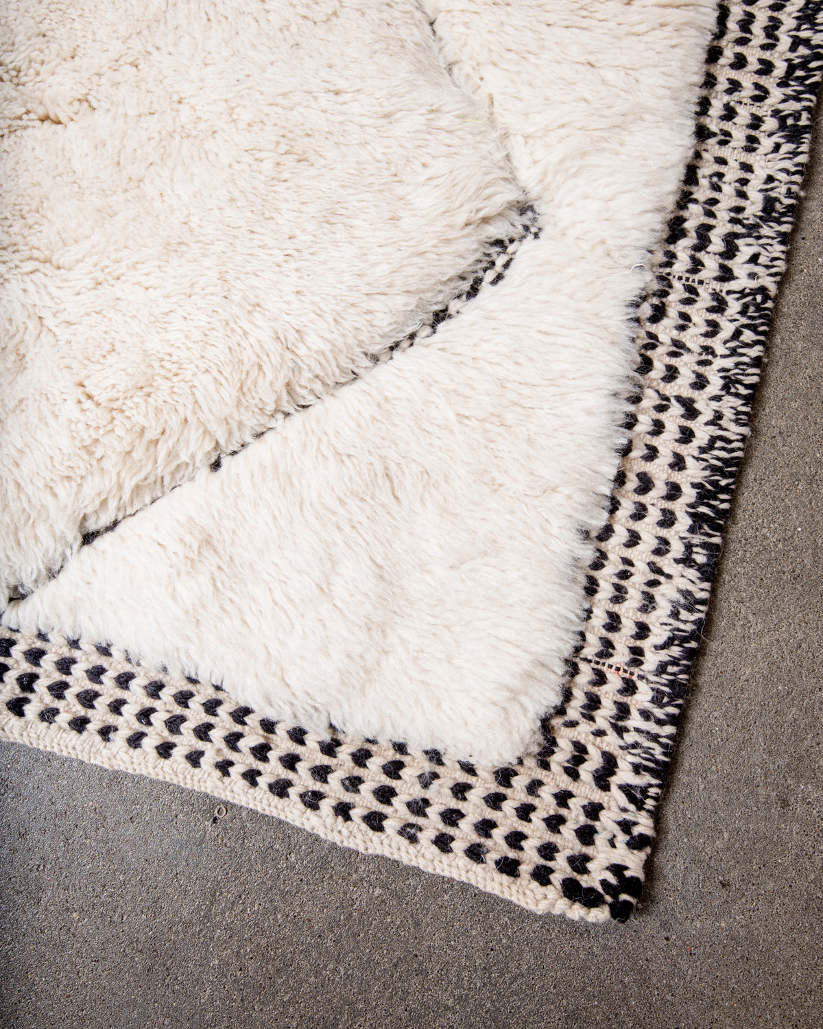 Modern, designer, handcrafted 100% sheep’s wool Berber rug from Morocco. Beni M’rirt carpet with beautiful colours and patterns and fluffy wool texture.